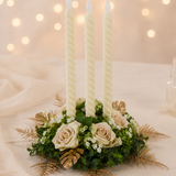 Table center pieces ,Floral arrangement with candles on a soft background
