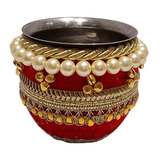 Decorated red and gold karwa for Sindoori Karwa Chauth thali set
