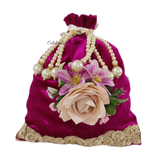 Matching potli bag with Magenta Karwa Chauth thali set