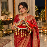 Woman holding Sindoori Karwa Chauth thali set for traditional Karwa Chauth pooja