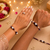 Sukoon Bhaiya Bhabhi Crystal Rakhi set — Amethyst bracelet pair for brother and sister-in-law by Celebration Kraft